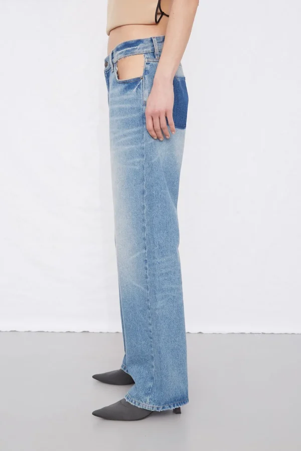 Gauchere Pocket cut out jeans.
